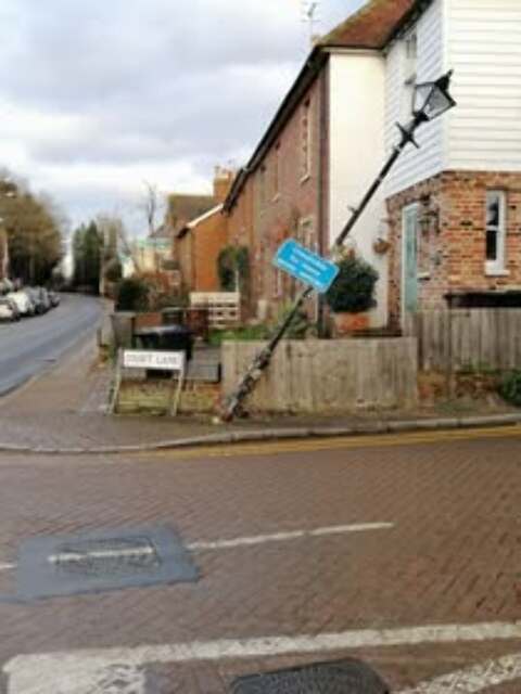 Entrance to Court Lane shortly after a Construction vehicle took out a street light.